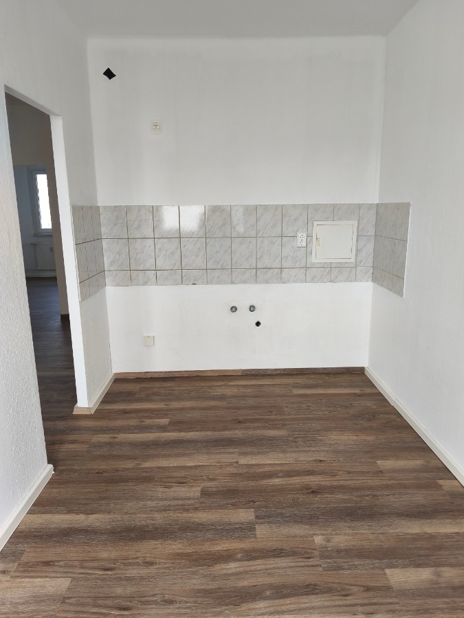 Der neue Bodenbelag ist der Eye-Catcher der Wohnung ! - Photo 3
